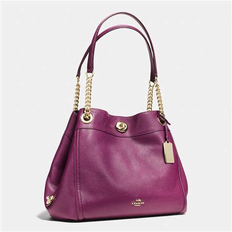 coach turnlock edie shoulder bag.